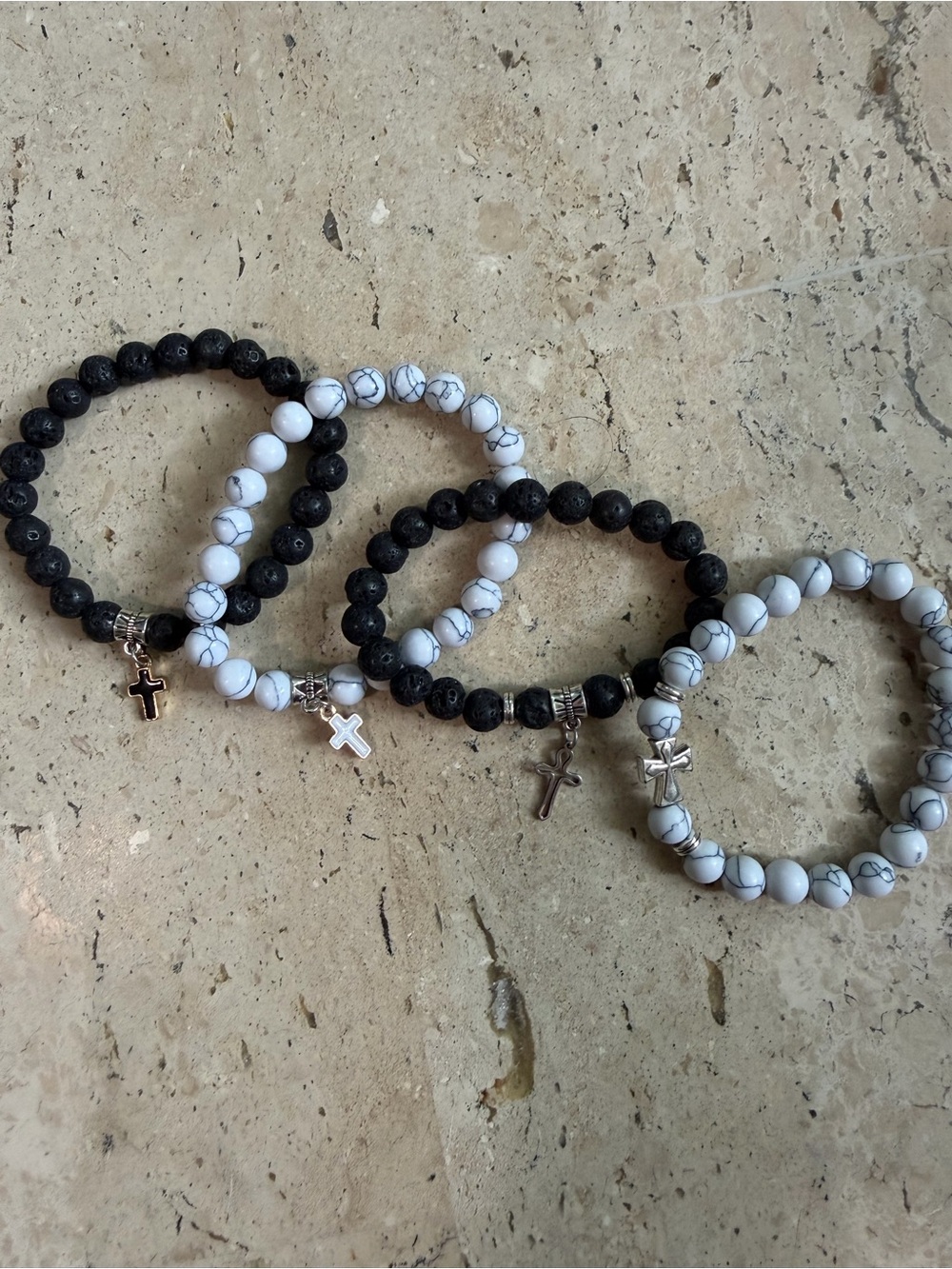 Four Black and White Natural Stone and Crosses Bracelets